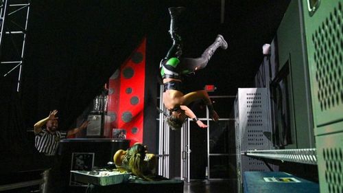 Rhea Ripley with a dive onto Gonzalez