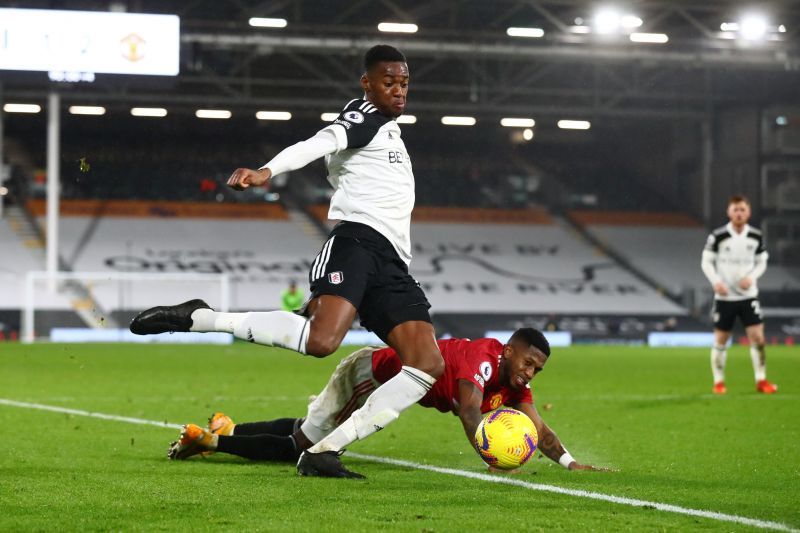 Tosin Adarabioyo of Fulham in action against Manchester United