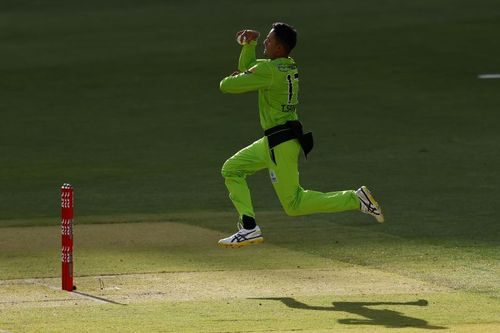 Tanveer Sangha in action in the Big Bash League