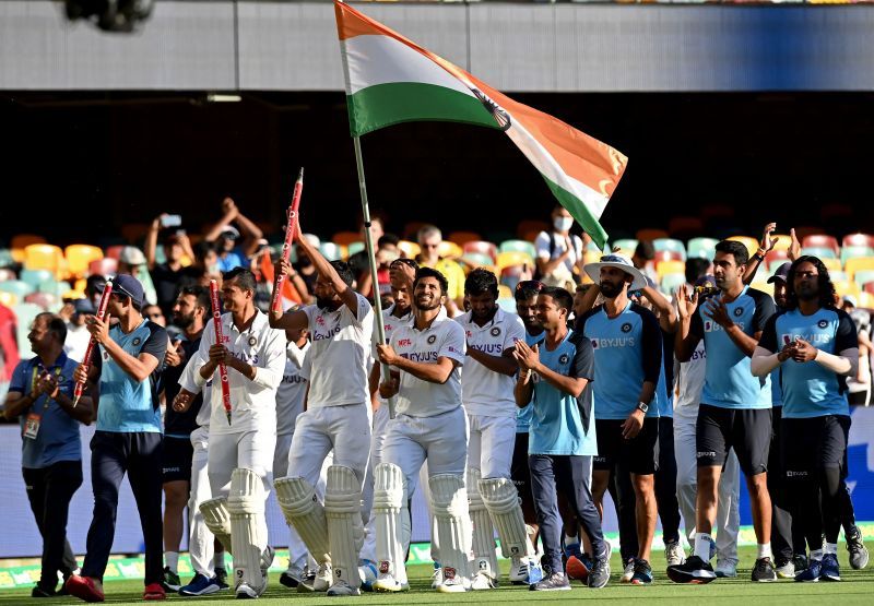 Indian team members celebrate the historic victory in Brisbane