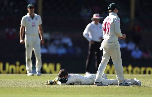 Tim Paine reacts after dropping Hanuma Vihari at the SCG on Day 5 of the Test