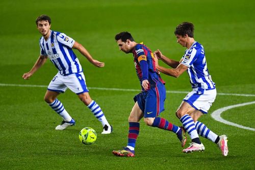 Lionel Messi and Le Normand battle for the ball during Barcelona's game against Real Sociedad last month