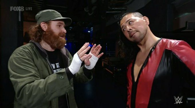 Sami Zayn trying to persuade Shinsuke Nakamura