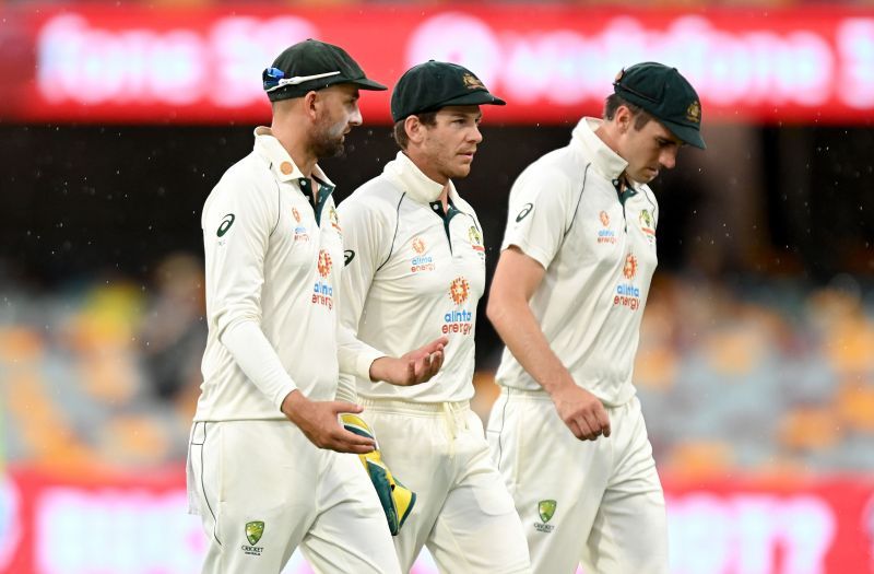 Australian players, Nathan Lyon. (L), Tim Paine, Pat Cummins