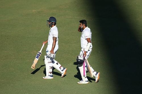 Hanuma Vihari and Ravichandran Ashwin walk back to the dressing room after a monumental partnership