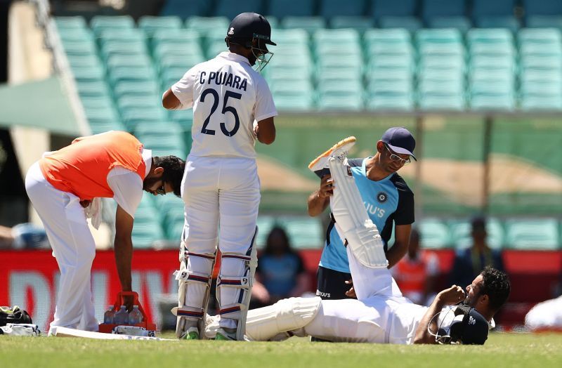 Hanuma Vihari receiving treatment on his hamstring from the physio