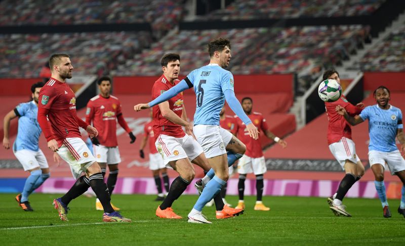 Manchester United&#039; Harry Maguire &amp; Co looking on as John Stones puts Manchester City into the lead.