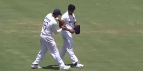 Mayank Agarwal shining the ball at the Gabba