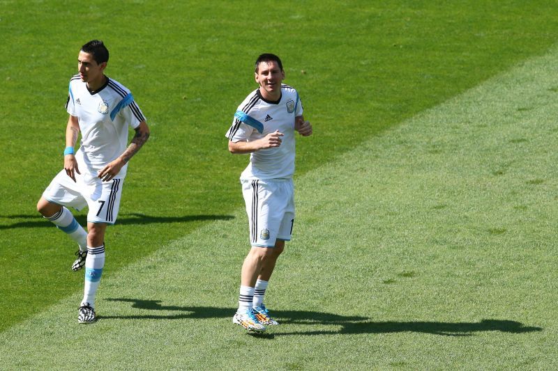 Di Maria and Lionel Messi before an Argentina match