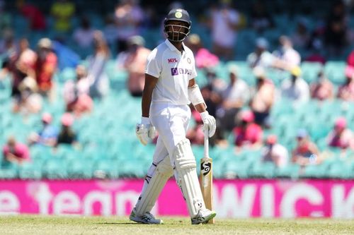 Cheteshwar Pujara laboured his way to a half-century on Day 3