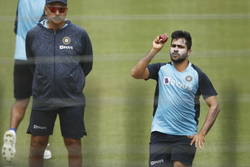 Shardul Thakur bowling under the eyes of head coach Ravi Shastri during a nets session