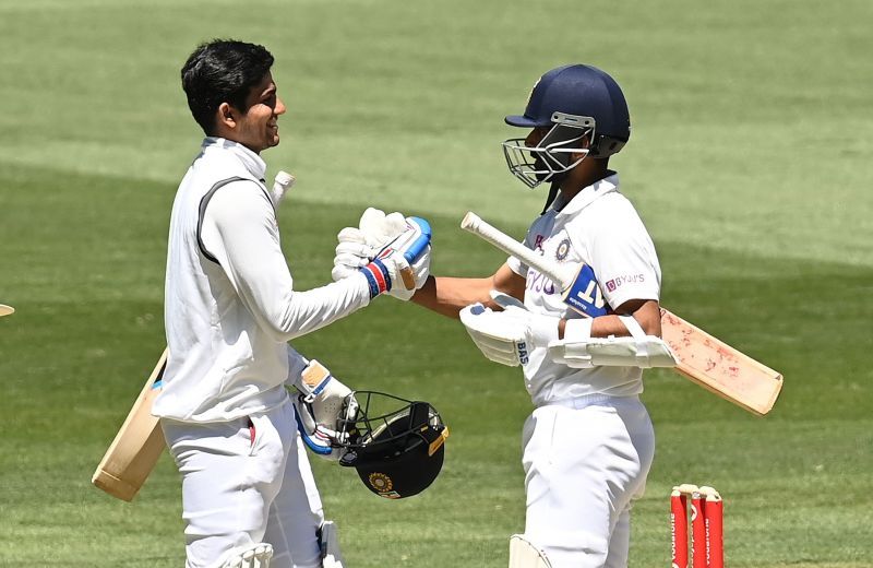 Stand-in skipper Ajinkya Rahane (R) and debutant Shubman Gill (L) celebrate India's Boxing Day Test win