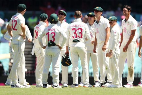 Australia have a first innings lead of 94 runs