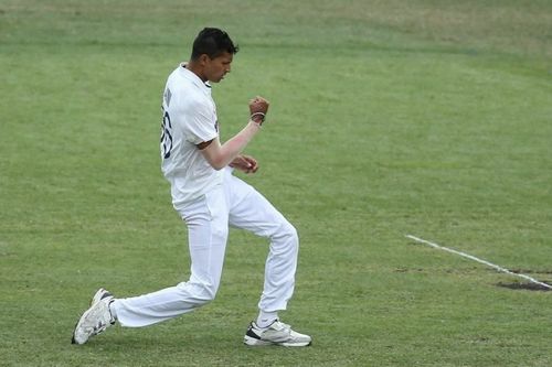 Navdeep Saini celebrates after picking up his maiden Test wicket, dismissing Will Pucovski.