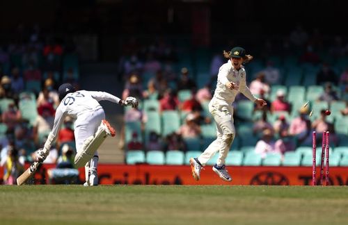 Australia's Will Pucovski celebrates Jasprit Bumrah's run-out at the SCG.