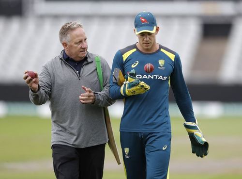 Ian Healy with Tim Paine (right)