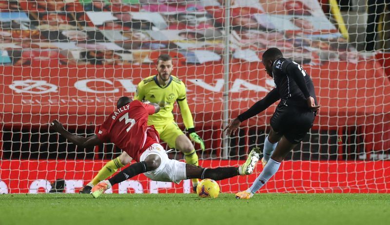 Eric Bailly with a last-ditch challenge in the dying embers of the game against Aston Villa
