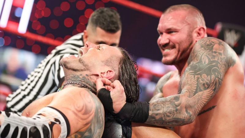 Randy Orton punishing Jeff Hardy on RAW Legends Night