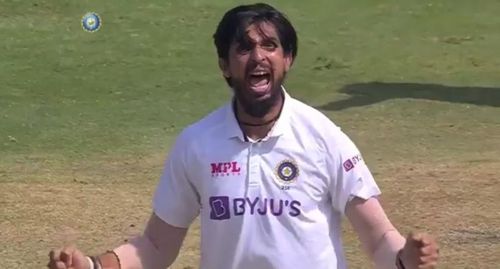 Ishant Sharma celebrates Rory Burns' wicket with a loud roar.