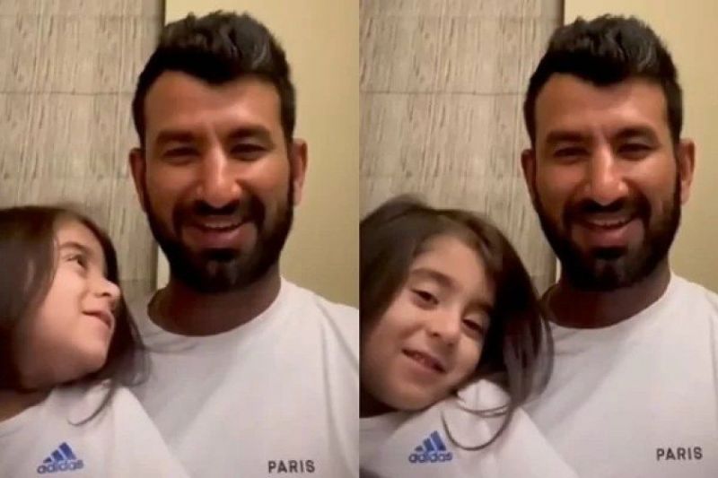 Cheteshwar Pujara with his daughter