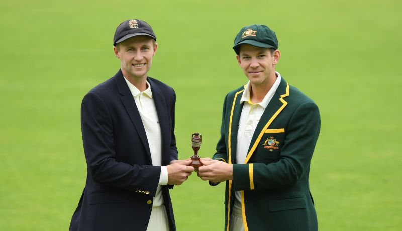 Joe Root (L) &amp; Tim Paine (R) with the Ashes urn.