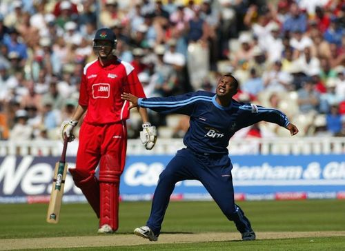 Nayan Doshi celebrates a wicket for Surrey in 2004