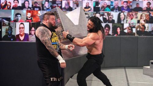 Kevin Owens and Roman Reigns