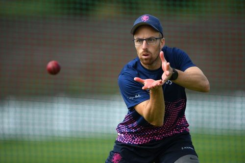 Jack Leach takes a catch in fielding practice.