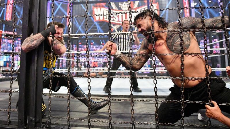 Jey Uso eliminates Kevin Owens from the Elimination Chamber on Sunday night.