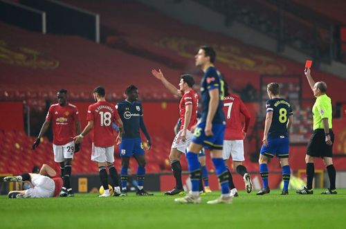 Alexandre Jankewitz is sent off against Manchester United on his first Premier League start