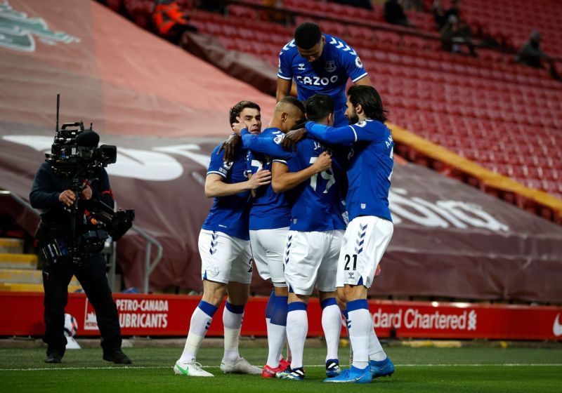Everton celebrate their opening goal against Liverpool at Anfield.