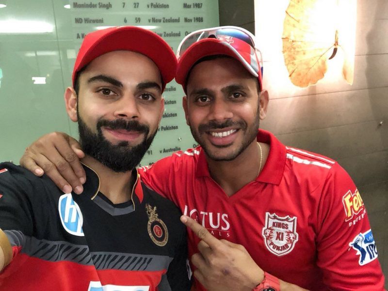 Virat Kohli and Manoj Tiwary (Photo: Twitter)