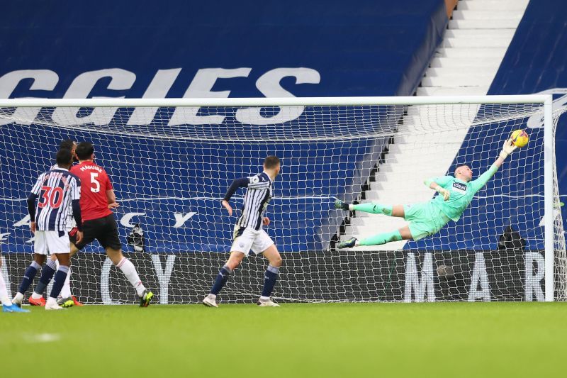 Sam Johnstone had to dive full stretch to deny a late Manchester United goal.