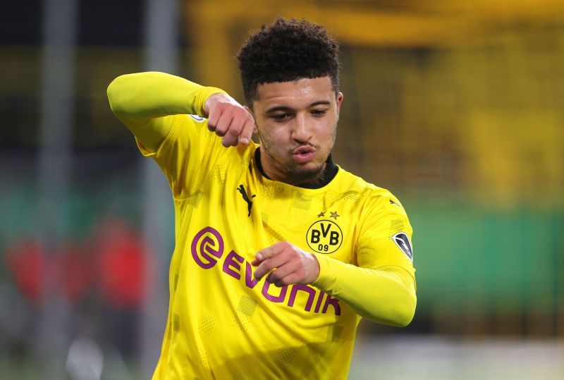 Jadon Sancho celebrates after scoring a goal for Borussia Dortmund.