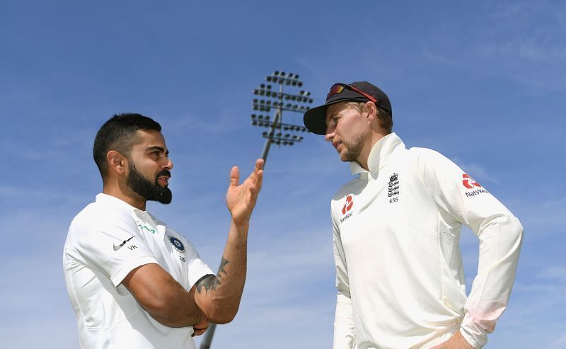 Virat Kohli and Joe Root in discussion