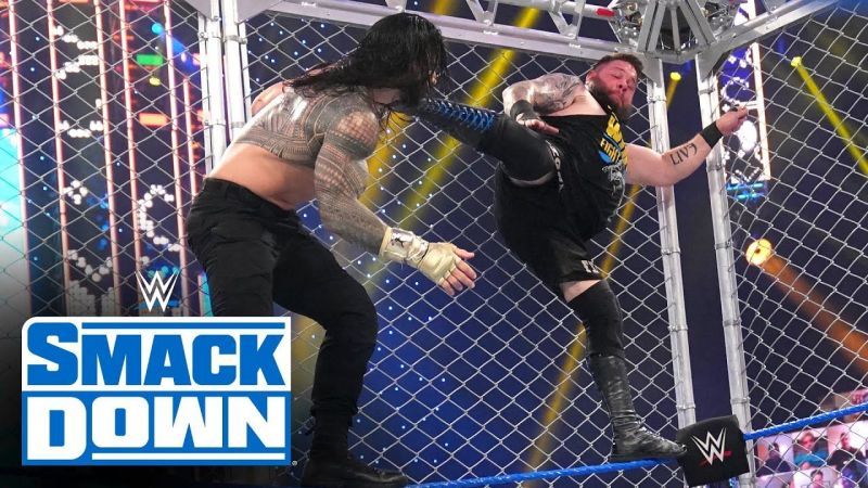 Kevin Owens and Roman Reigns battled it out inside a steel cage