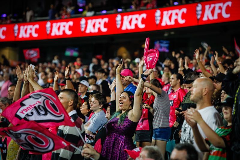 Fans enjoying the battle between the Sydney Sixers and the Perth Scorchers at the Sydney Cricket Ground