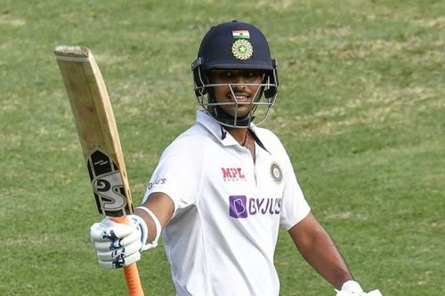 Washington Sundar celebrates after reaching his half-century