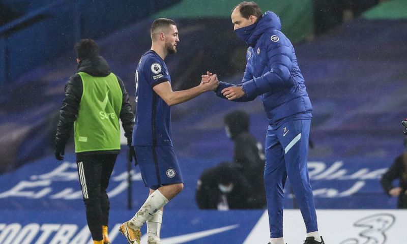 Mateo Kovacic celebrates with Thomas Tuchel following Chelsea's win against Sheffield United.