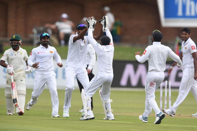 Sri Lanka cricket team celebrating a fall of wicket.