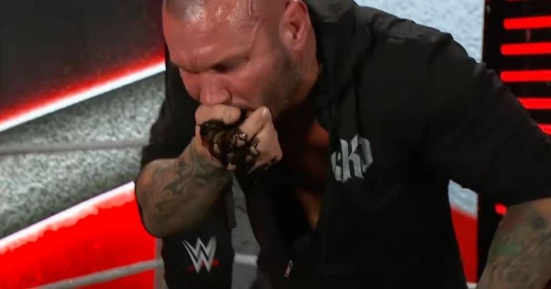 Randy Orton vomiting black blood.