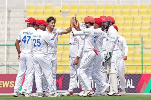 Amir Hamza celebrates Ryan Burl's wicket with her team-mates, Afghanistan vs Zimbabwe, 2nd Test, Abu Dhabi, 3rd day, March 12, 2021