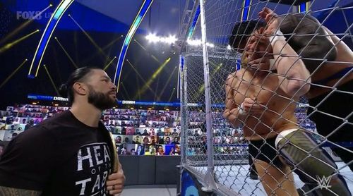 Roman Reigns watched on carefully