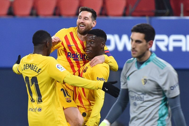 Moriba celebrates with Ousmane Dembele and Lionel Messi after scoring his first goal for the club