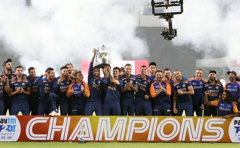 Suryakumar Yadav and Ishan Kishan lift the T20I trophy after India beat England in the fifth game.