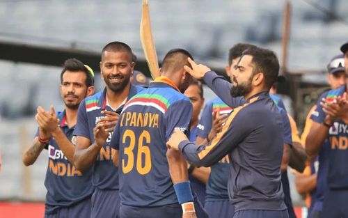 Krunal Pandya cheered by his teammates as he walks back to the pavilion