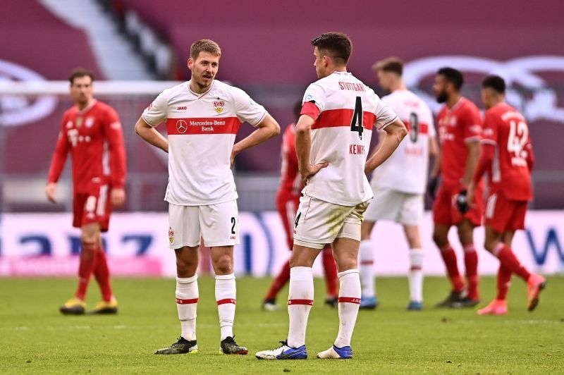 VfB Stuttgart players look dejected after conceding a goal.