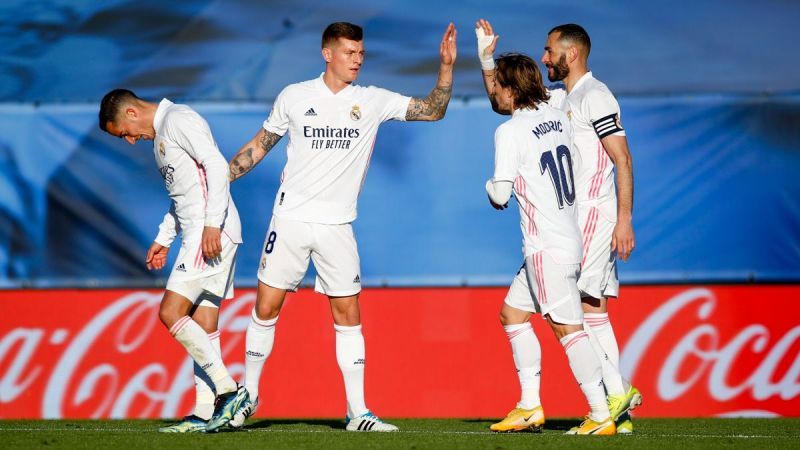 Karim Benzema&#039;s double helped Real Madrid beat Elche 2-1 in the La Liga.