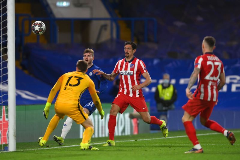Atletico defenders and stopper Jan Oblak look upon as Timo Werner for Chelsea take a shot at the goal.