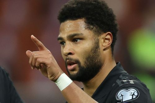 Serge Gnabry celebrates after scoring Germany's lone goal against Romania.